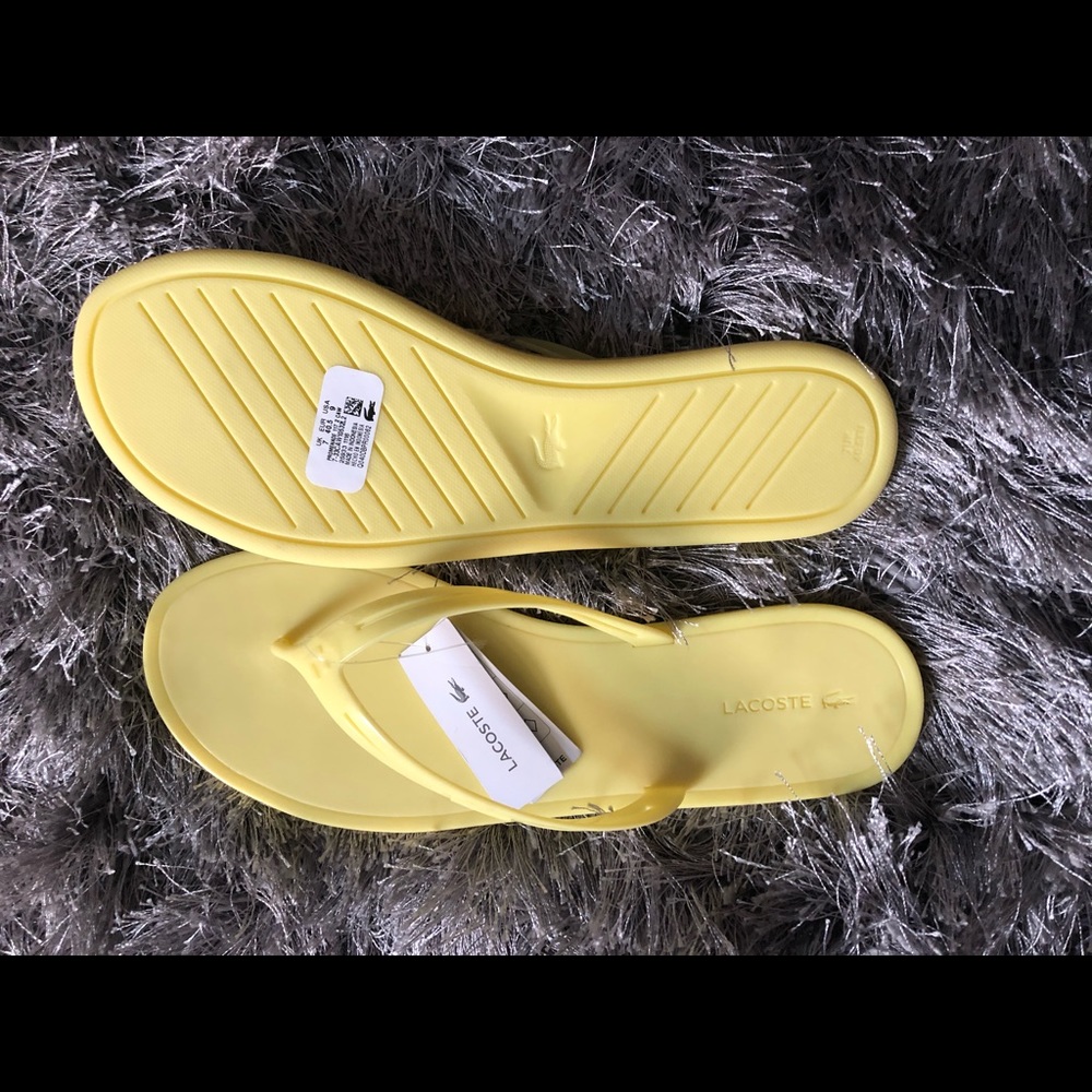 Size 9 Lacoste flip flops